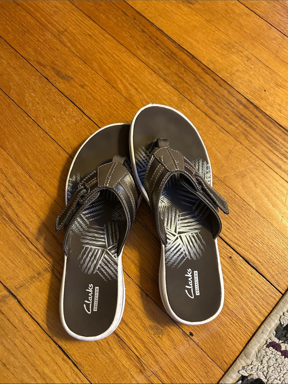 Clarks Dark Brown Slip-On Thong Sandals with White Trim